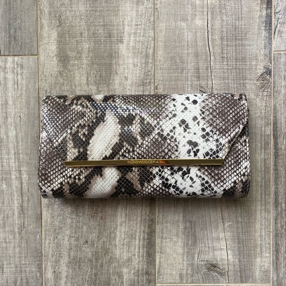 BCBGeneration Handbags - BCBGeneration faux snakeskin purse with gold chain.  Great condition.